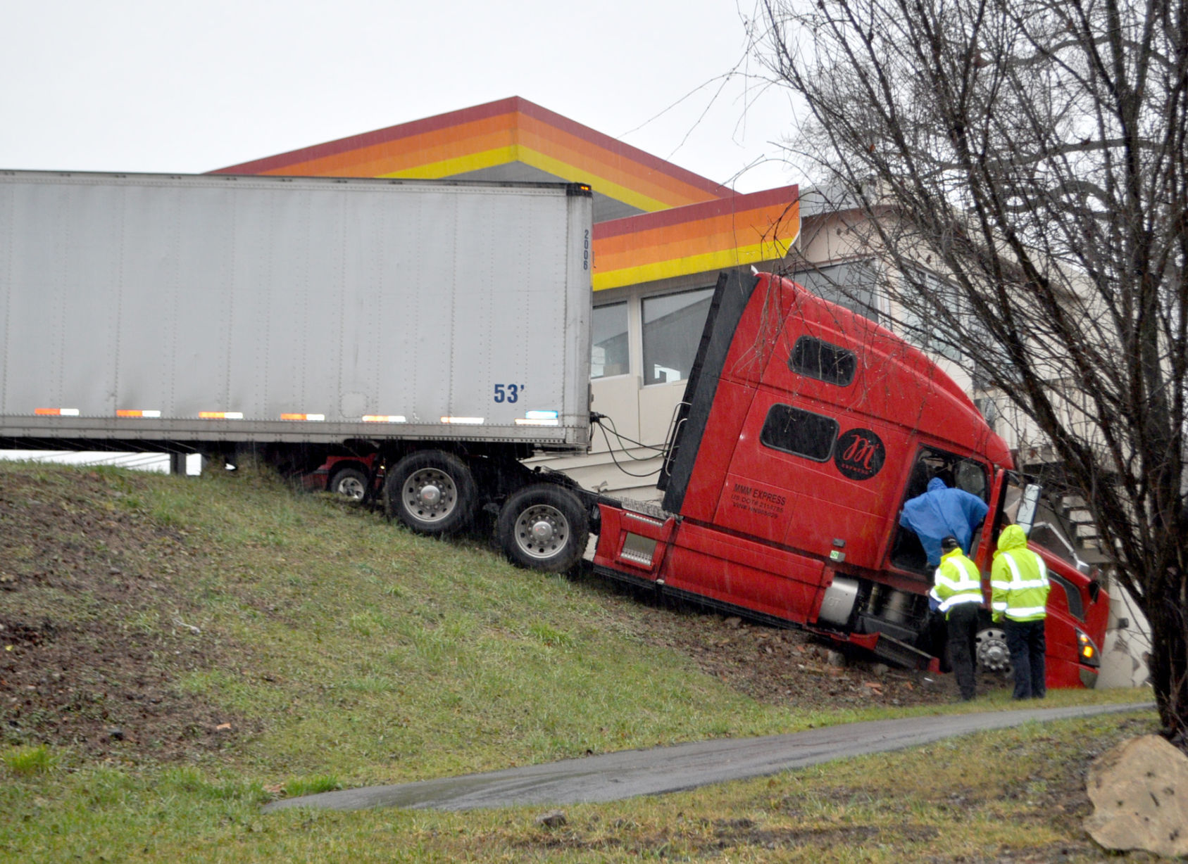 Truck strikes gas station in South Side